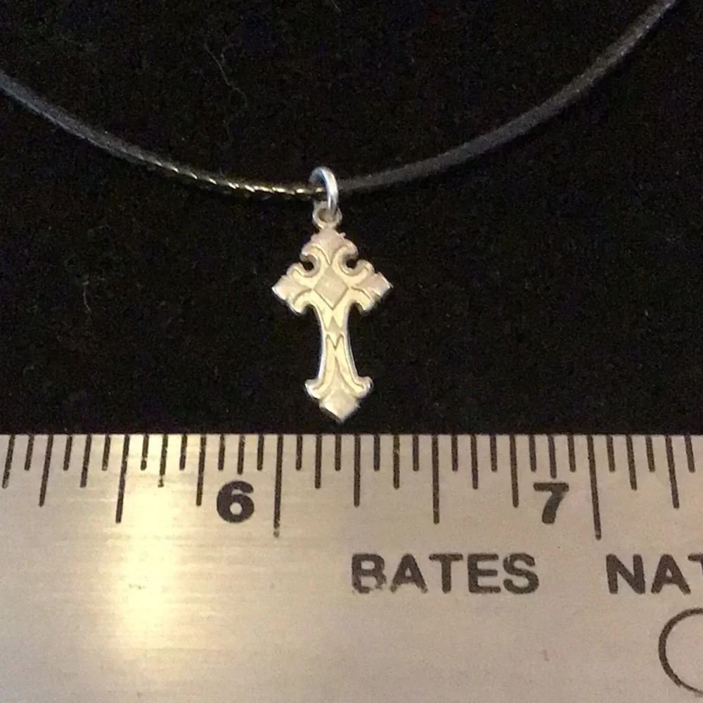 Tiny Sterling silver cross